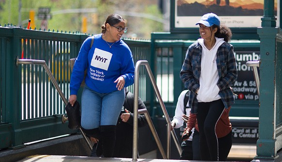 Students arriving at Columbus Circle after an outing