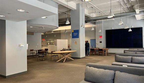 Couches and tables in renovated Enrollment Services Center