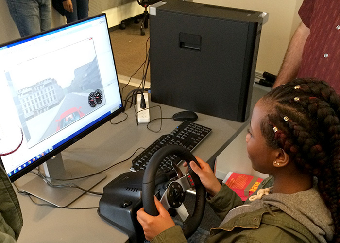 Girl Simulates Driving