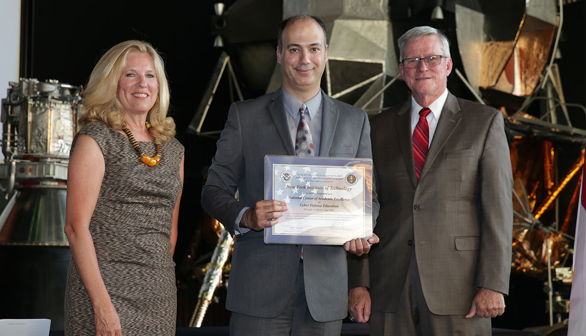 Suzanne Spaulding, Thaier Hayajne, Ph.D. and Dr. Leonard Reinsfelder.