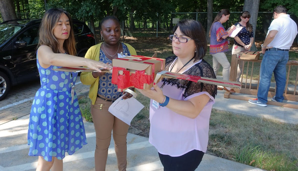 Associate Professor Hui-Yin Hsu with NYIT pre-service teachers