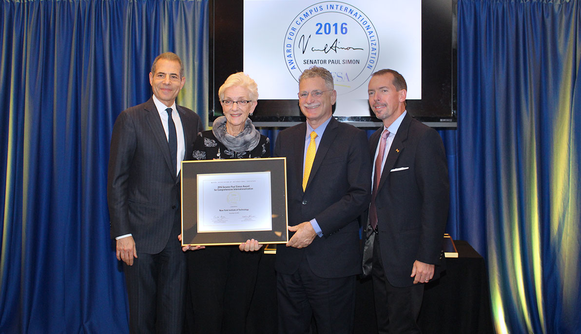 President Edward Guiliano with Richard Stengel, Marlene M. Johnson, and Martin Simon.