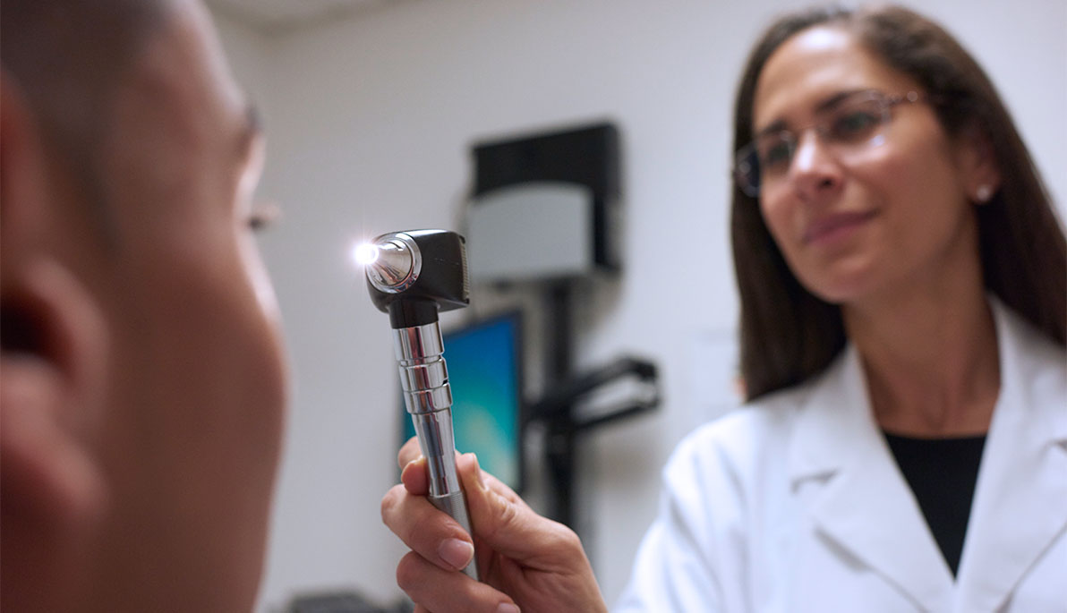 A doctor examining a patient.