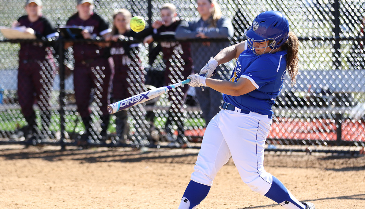 NYIT softball player at bat.