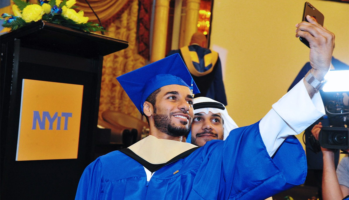 NYIT student posing for a selfie with a friend.