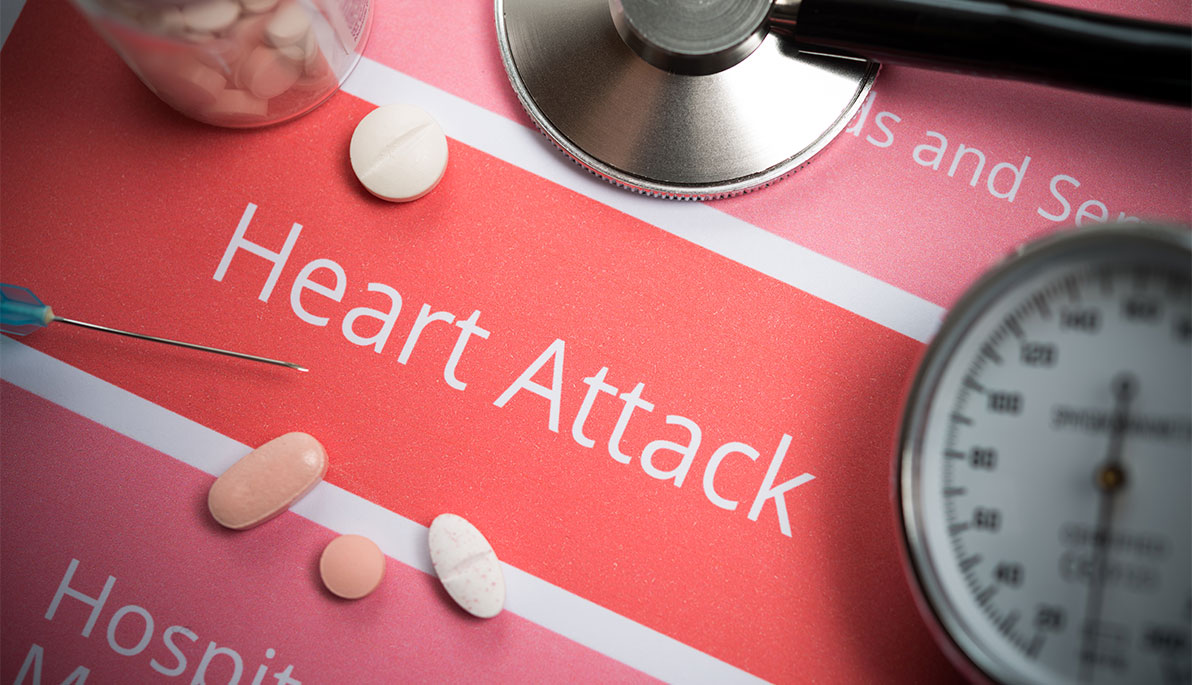 Pills, pill bottle, a stethoscope, and blood pressure monitor