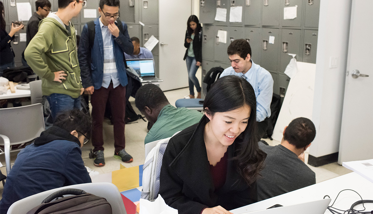 NYIT students working on projects.