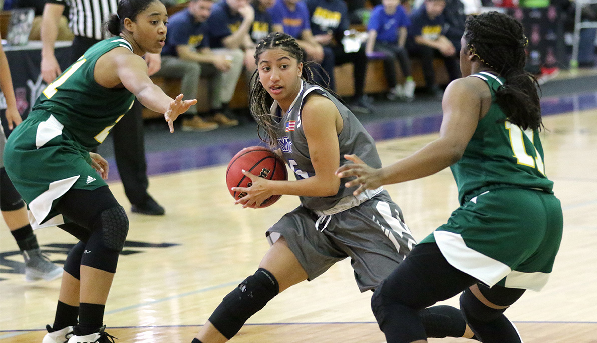 NYIT women’s basketball player on the court