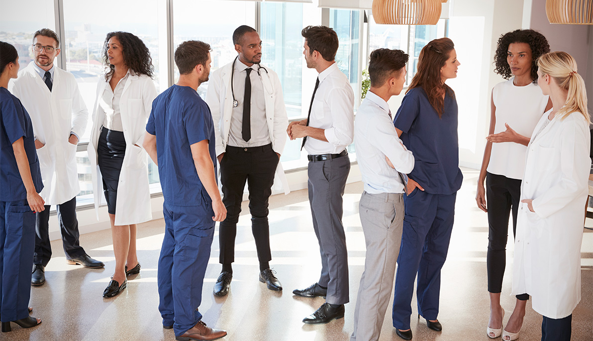 Male and female doctors talking.