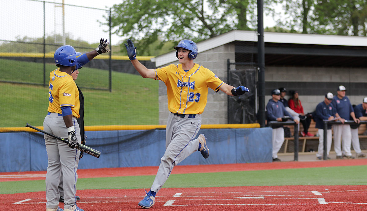 NYIT baseball player running to home plate. NYIT baseball player running to home plate.