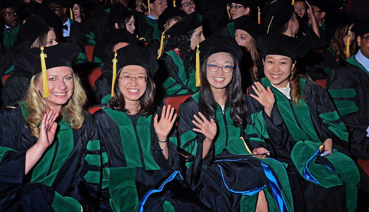 NYITCOM students at the hooding ceremony.