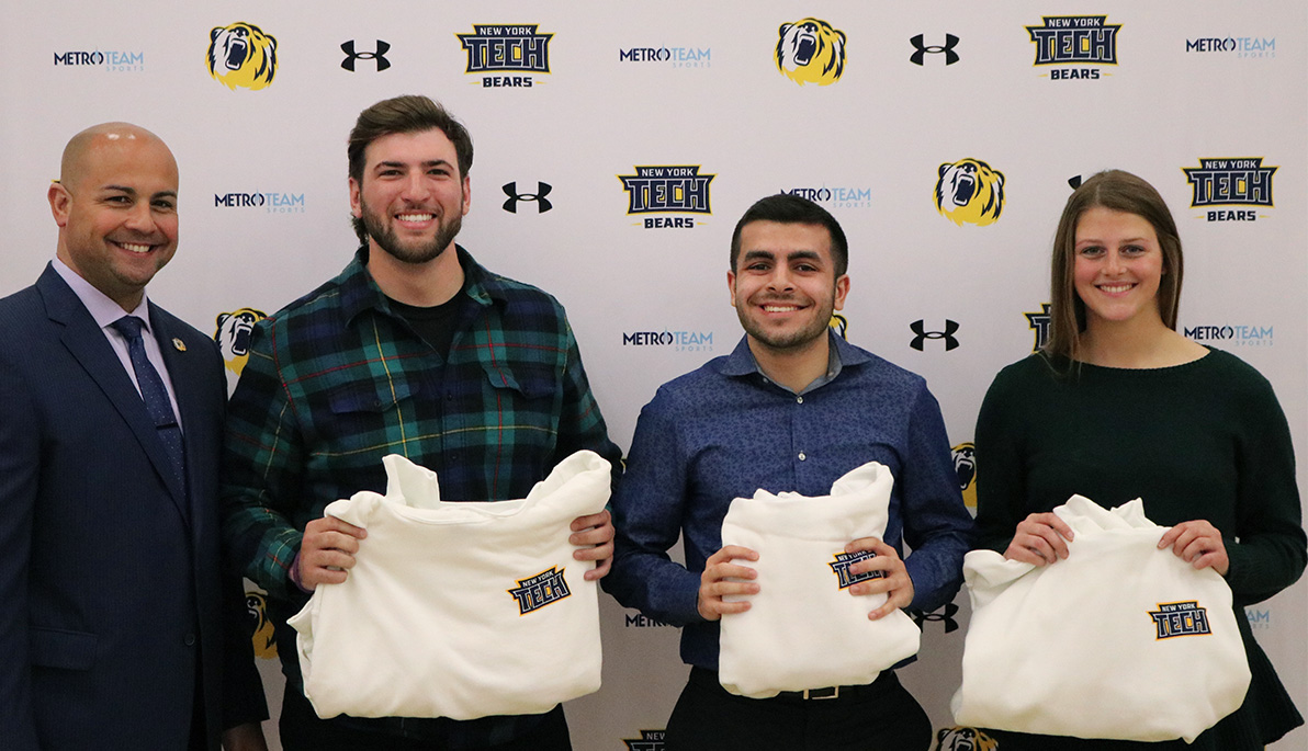 New York Tech student-athletes with Athletics Director Dan Vélez