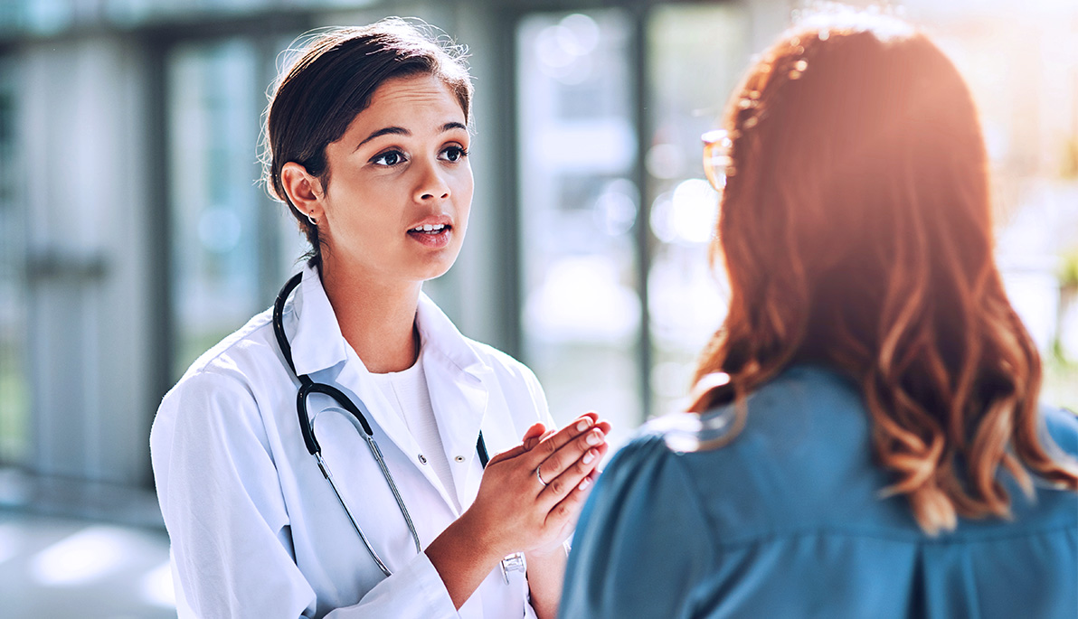 Doctor speaking with a patient