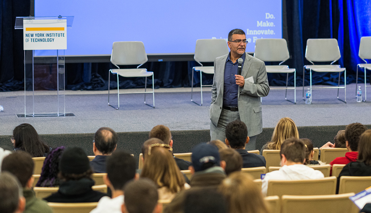 Dean Babak Beheshti speaking to an audience.