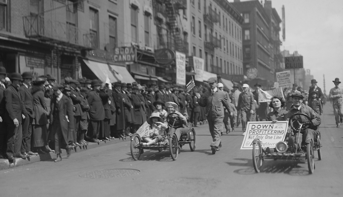 Marchers protesting the high cost of living at the Overalls Parade.