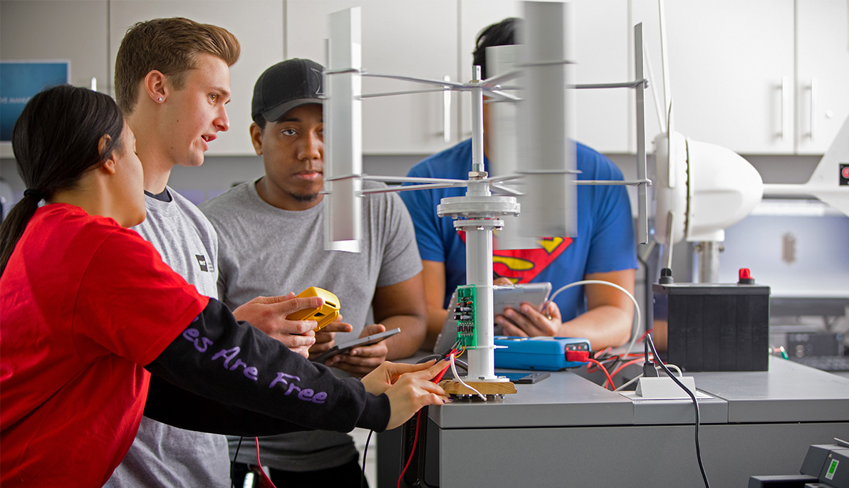 Students working with turbines 