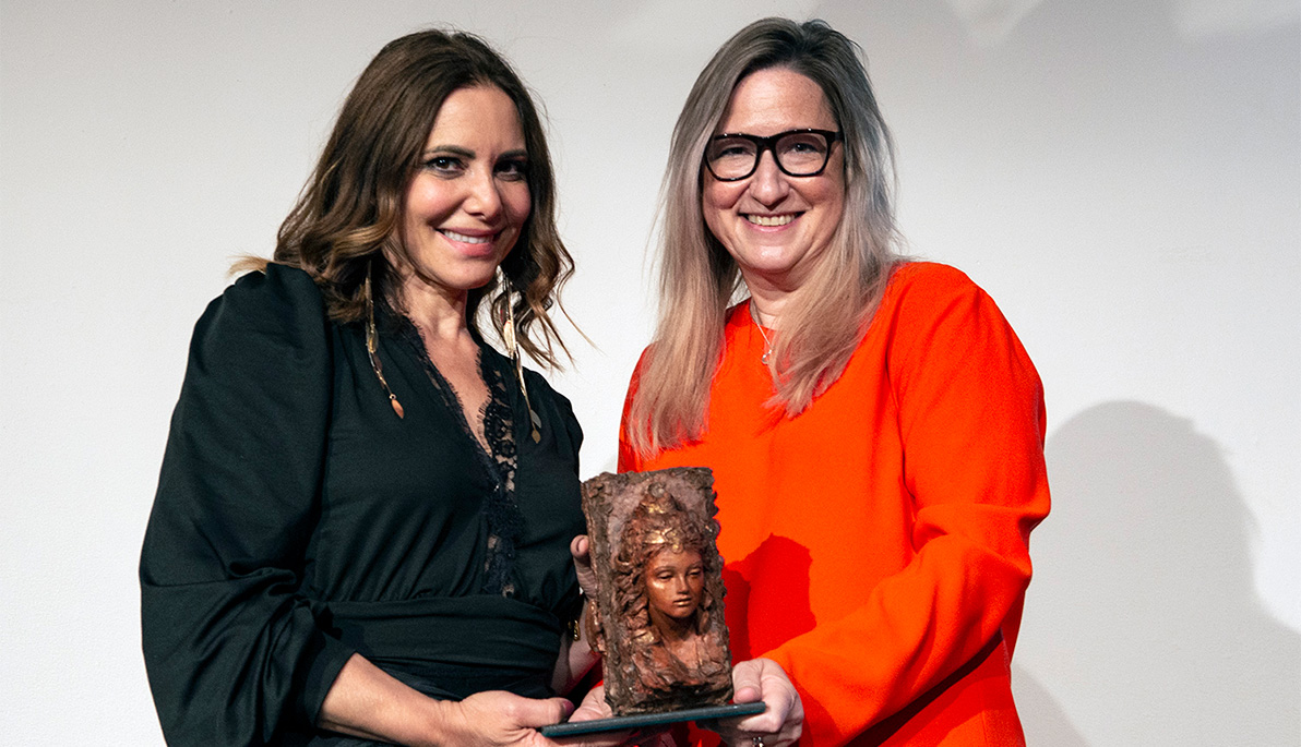 Rozina Vevetsi and Suzanne Musho holding the CITYarts award.