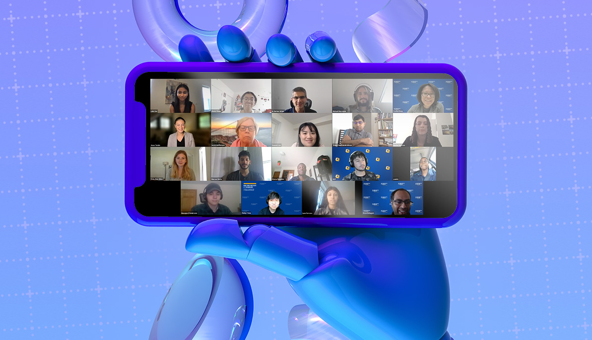 Robot hand holding smart phone showing a Zoom meeting. Robot hand holding smart phone showing a Zoom meeting.