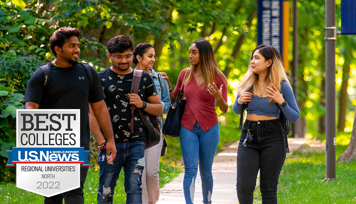 New York Tech students walking on the Long Island campus.