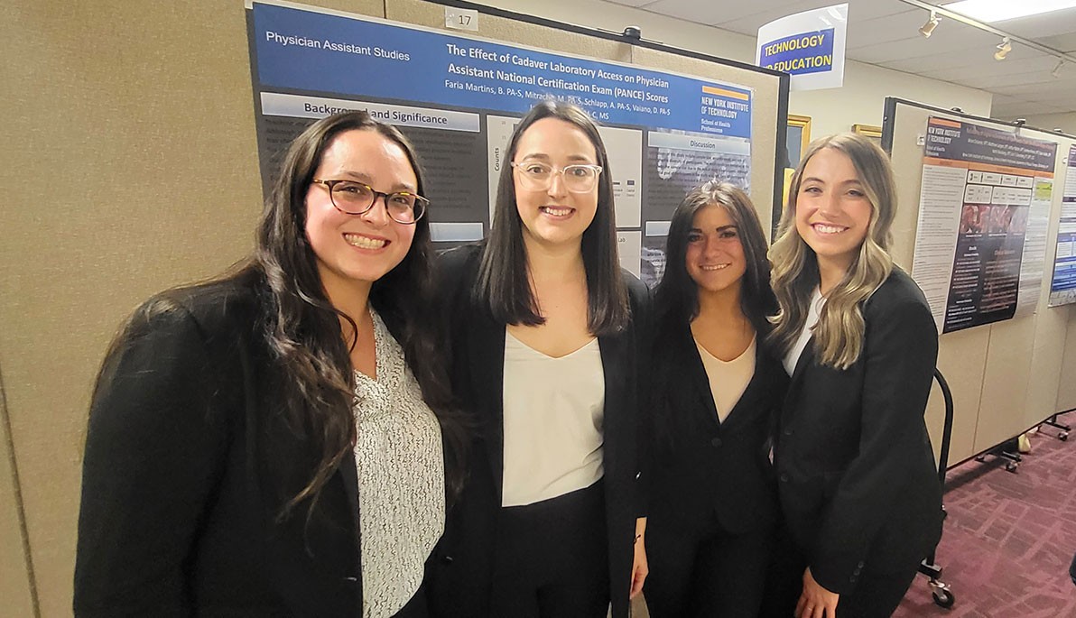 Students in front of a poster at Aletheia.