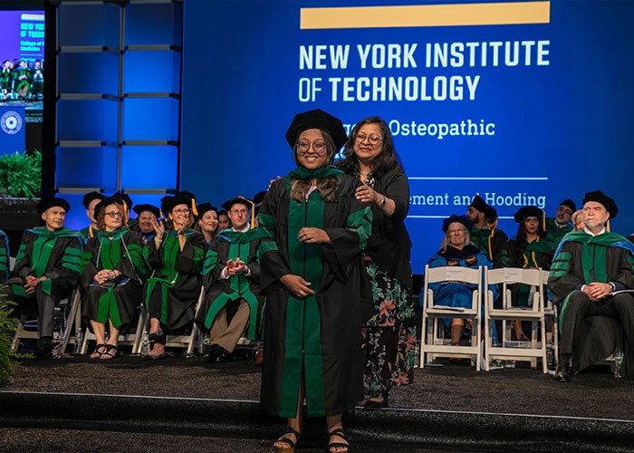 NYITCOMStudentPromiRahmanAndHerMotherHooding2023