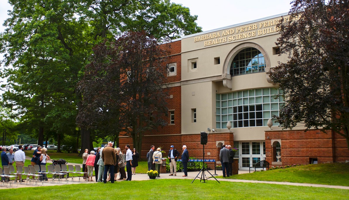 Attendees outside the Barbara and Peter Ferentinos Health Science Building