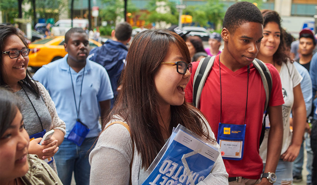 New students outside in a city