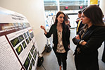 Amanda Kaminaris talked heart research with a SOURCE attendee. She collaborated on her project with faculty mentor Qiangrong Liang, M.D., Ph.D.