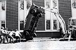 <strong>Throwback Thursday</strong> This photo dates to 1973, when an oil embargo against the United States spurred an energy crisis in the country and renewed the public's interest in electric cars. Engineering students under the direction of Professor Edward Kafrissen, Ph.D., lowered a 1965 General Motors Corvair into the machine shop inside Harry Schure Hall at the Old Westbury campus. The group later removed the engine and installed an electric motor with a rechargeable battery.