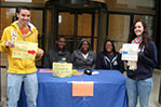 <strong>Alumnus Remembers Hurricane Sandy Relief</strong> Larry Kamguia (M.A. '13), assistant director of career services (pictured second from left), counts a difficult period as one of his proudest experiences at NYIT: when Hurricane Sandy hit the New York tri-state area in 2012. The storm made landfall on Oct. 29 and affected everyone at NYIT. "It was my first time experiencing a hurricane," said Kamguia. "Many of my classmates saw their homes destroyed by Hurricane Sandy. Our fundraiser was a way for me and other students to show our support for affected families. It's this sense of solidarity during hard times that makes me proud to be part of the NYIT community."