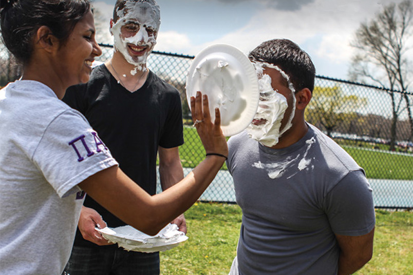 <strong>MayFest Never Gets Old at NYIT</strong> From wearing fun T-shirts to "pieing" for charity, MayFest has always brought good cheer to campus over the years.