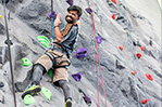 Reaching new heights on the indoor climbing wall.