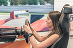 Experiencing a Formula 1 race car simulator.