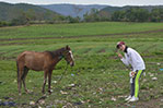 NYIT student Yan Xu takes some time to “horse around.”