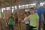 A work in progress: Some of the group members inside the unfinished house.