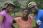 NYIT student Chanelle Sears poses with Jorge, a Bridges to Community leader, and a local woman.