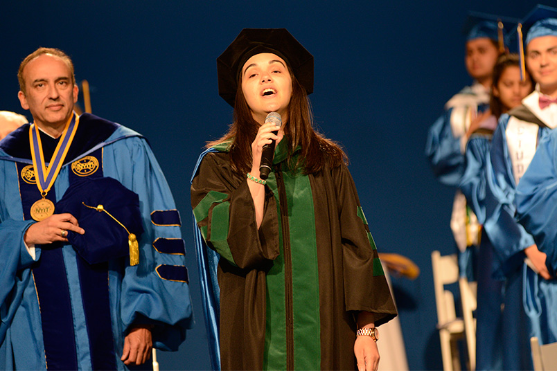 Andrea LaRosa (D.O., Osteopathic Medicine, Islip, N.Y.) sang the national anthem.