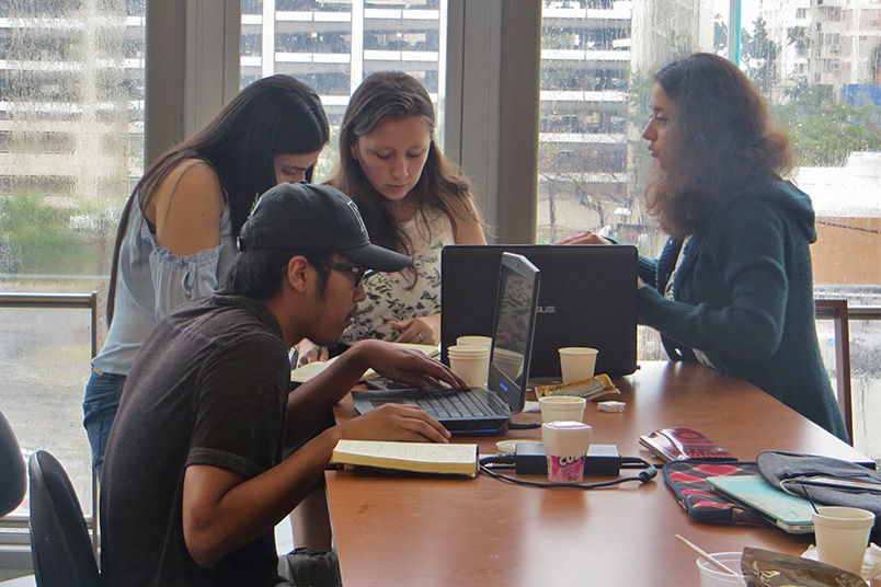 NYIT students brainstorming ideas in the Puerto Rico Re_Start International Workshop at the Universidad de Puerto Rico Rio Piedras in San Juan.