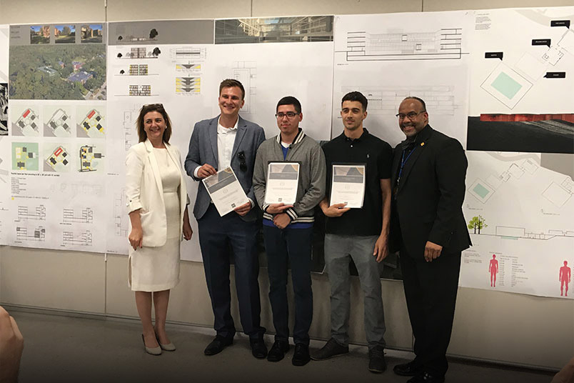 Arkadiusz Chrobac, Luis Bruni, and Santiago Molina pose with deans Maria Perbellini and Sheldon Fields.