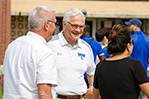 NYIT President Hank Foley, Ph.D., greets attendees.