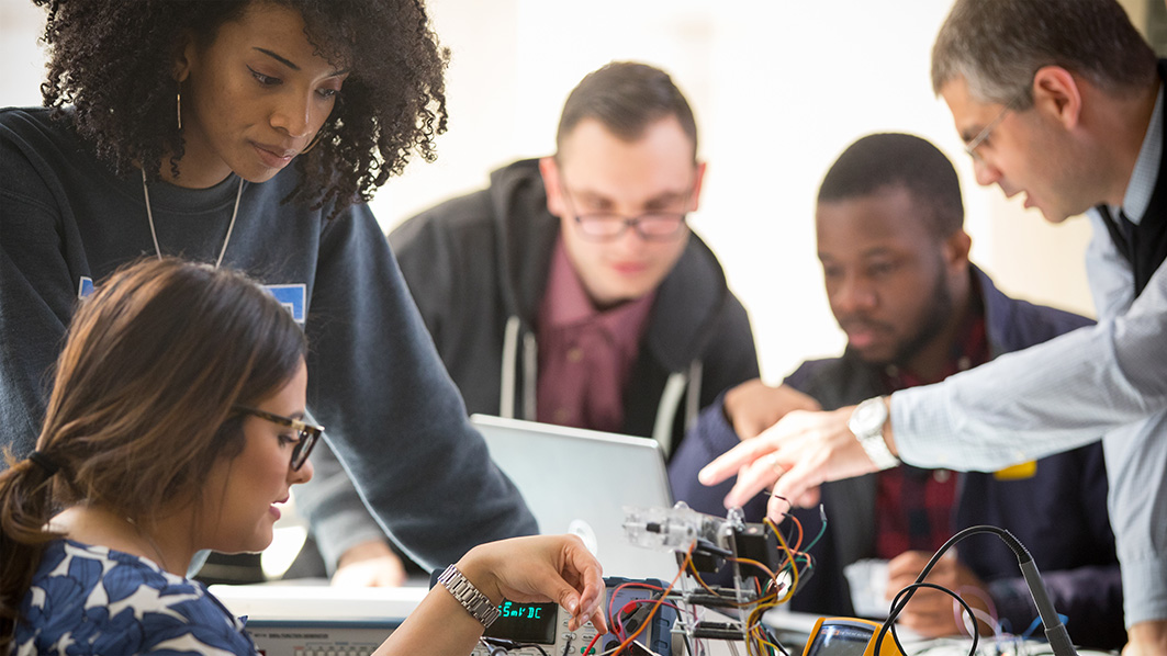 Group of NYIT students rewiring device